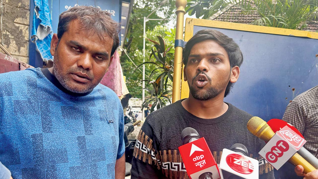 Victim’s brother Ashraf (black T-shirt)