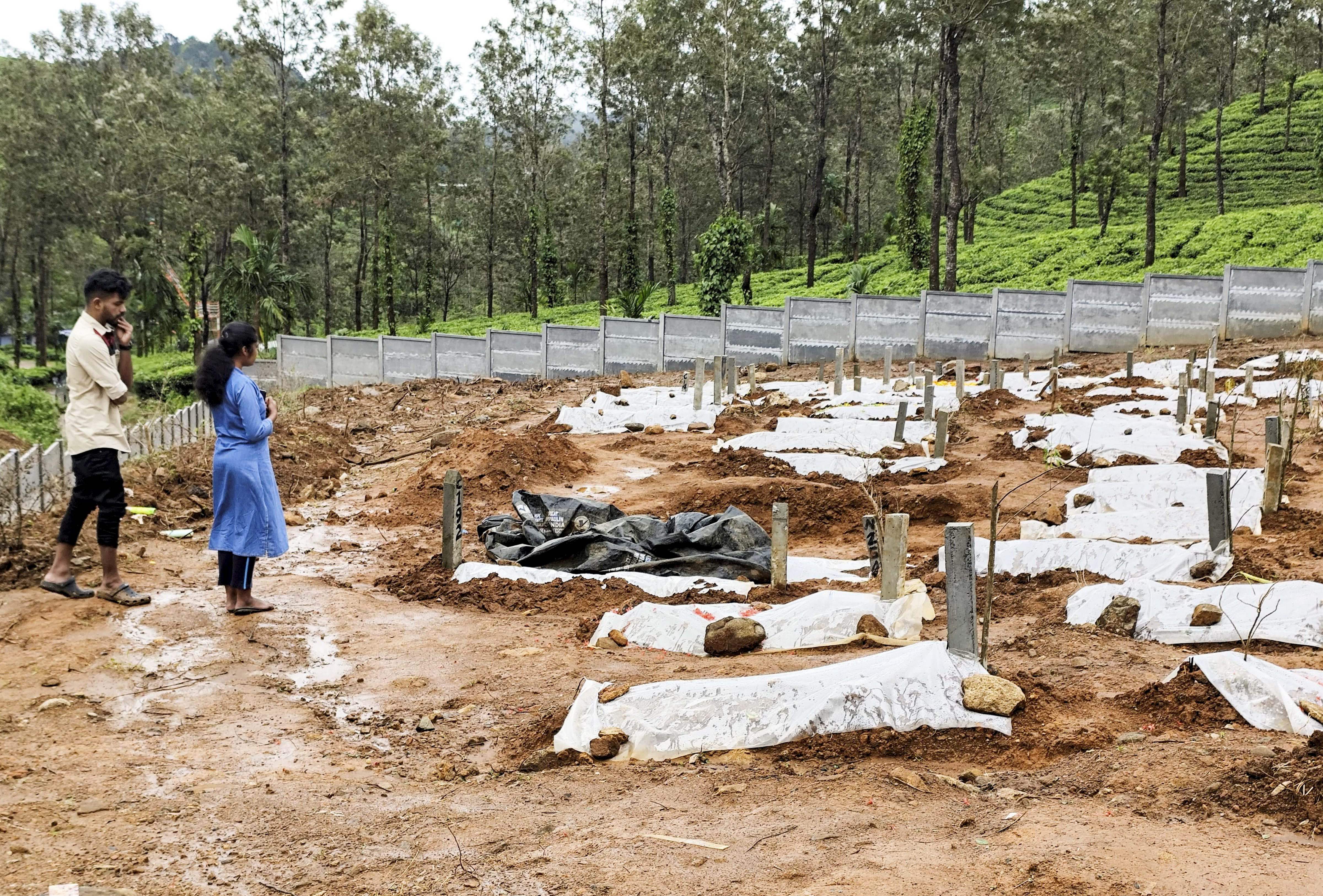 Wayanad residents Shruthi and Jason at the Puthumala graveyard to pay respects to Shruthi's family who died in the landslides. Shruthi and Jason will be getting married in September 
