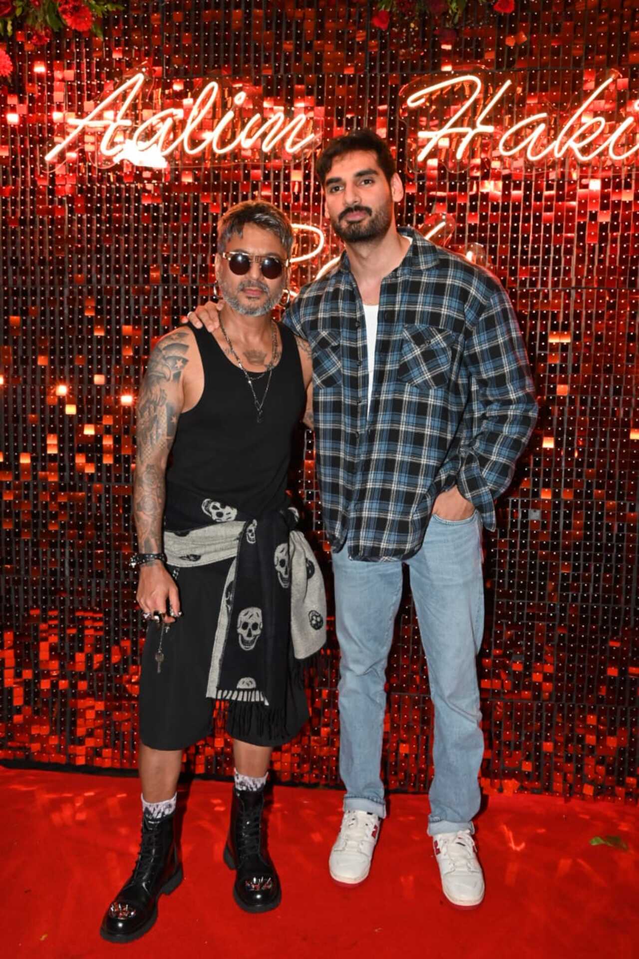 Their son Ahan Shetty continued his fashion streak with flannel shirts even at this event. 
