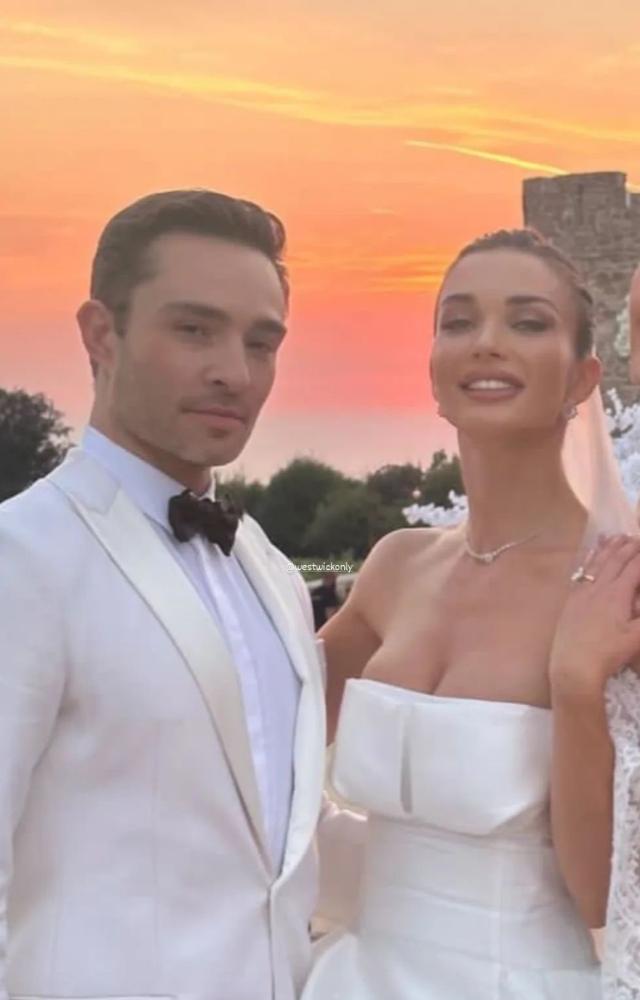 For her wedding, she chose a floor-length, beautifully layered gown in a bouncy, ball gown-like style, making her look straight out of a fairytale.