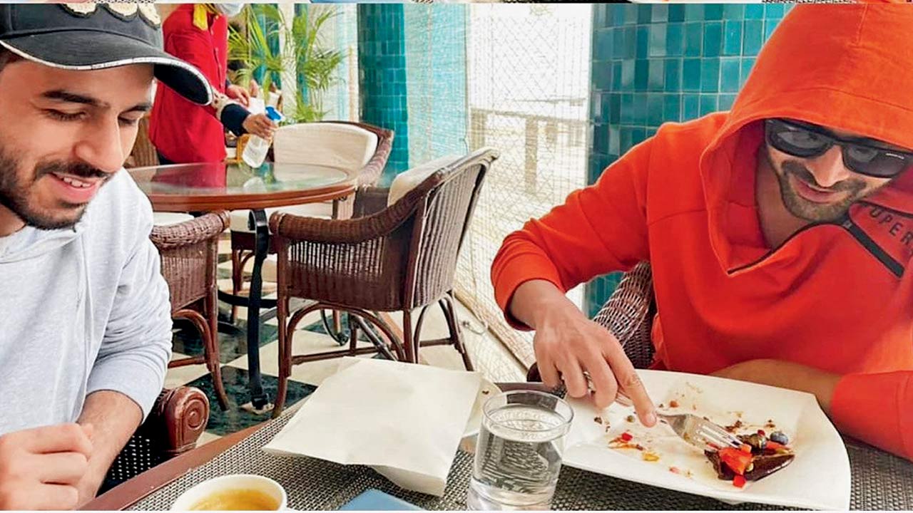 Arora with Kartik Aaryan