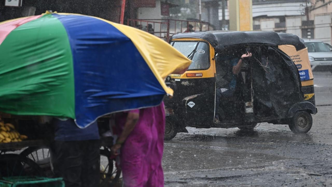 IN PHOTOS: Rains give residents respite from heat in Badlapur 