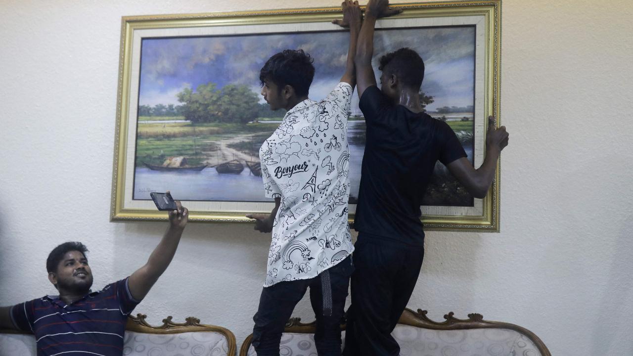 Young protesters were spotted taking paintings off the wall and snapping selfies inside Sheikh Hasina's home. This protest arose in reaction to discriminatory hiring policies that reserved most positions for the children of freedom fighters. 
