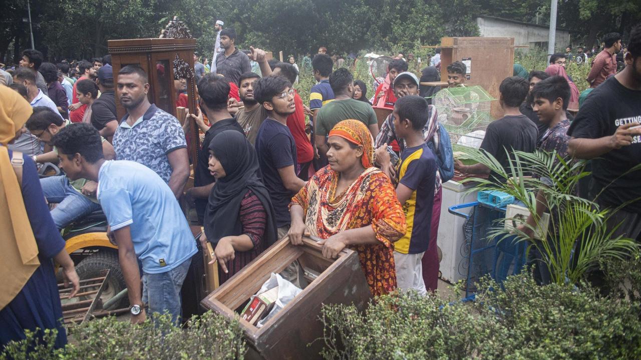 Crowds took their revenge on the fallen leader. Some smashed statues of Hasina's father, Sheikh Mujibur Rahman, the country's independence hero after the war that split the South Asian nation from Pakistan in 1971. While some looted home decor items, furniture, rugs and more