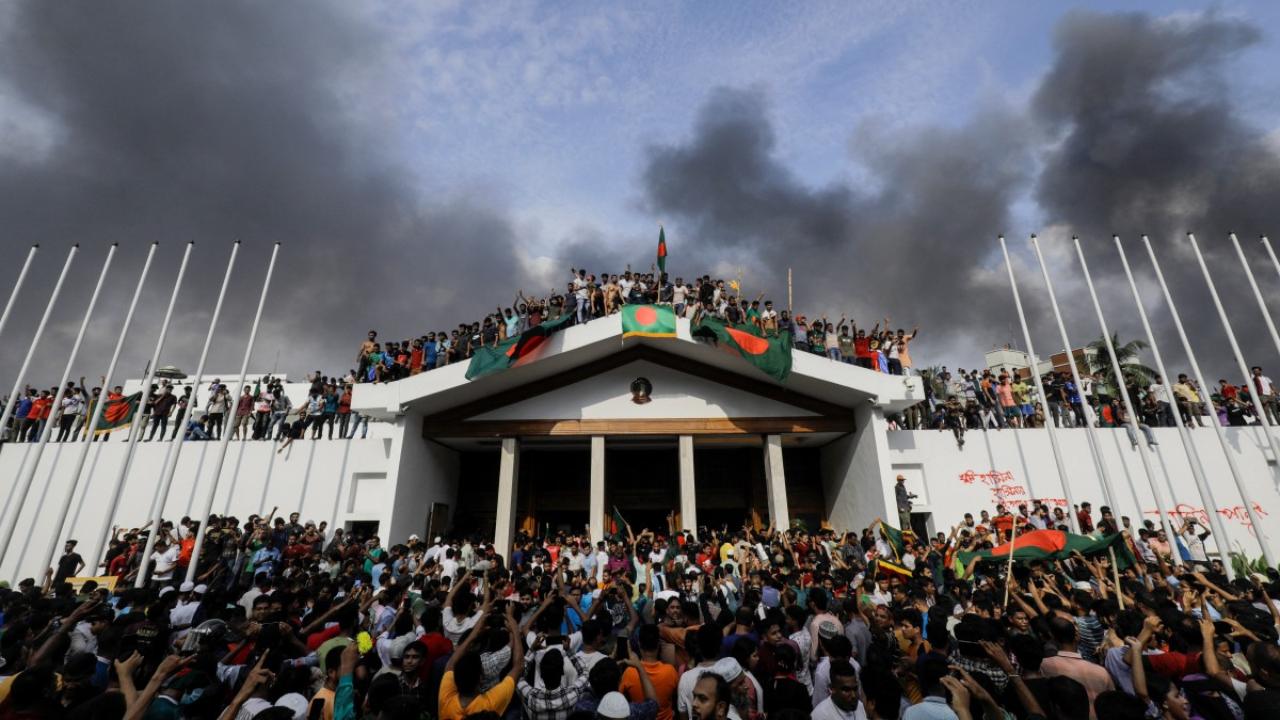 A key symbolic target of protesters was the premier's official residence, a sprawling palace in the heart of the capital. Some were shown on broadcasters laughing as they explored Hasina's home -- lying in the beds and carrying off books and televisions. Others raided the kitchen, gleefully devouring food that was left behind
