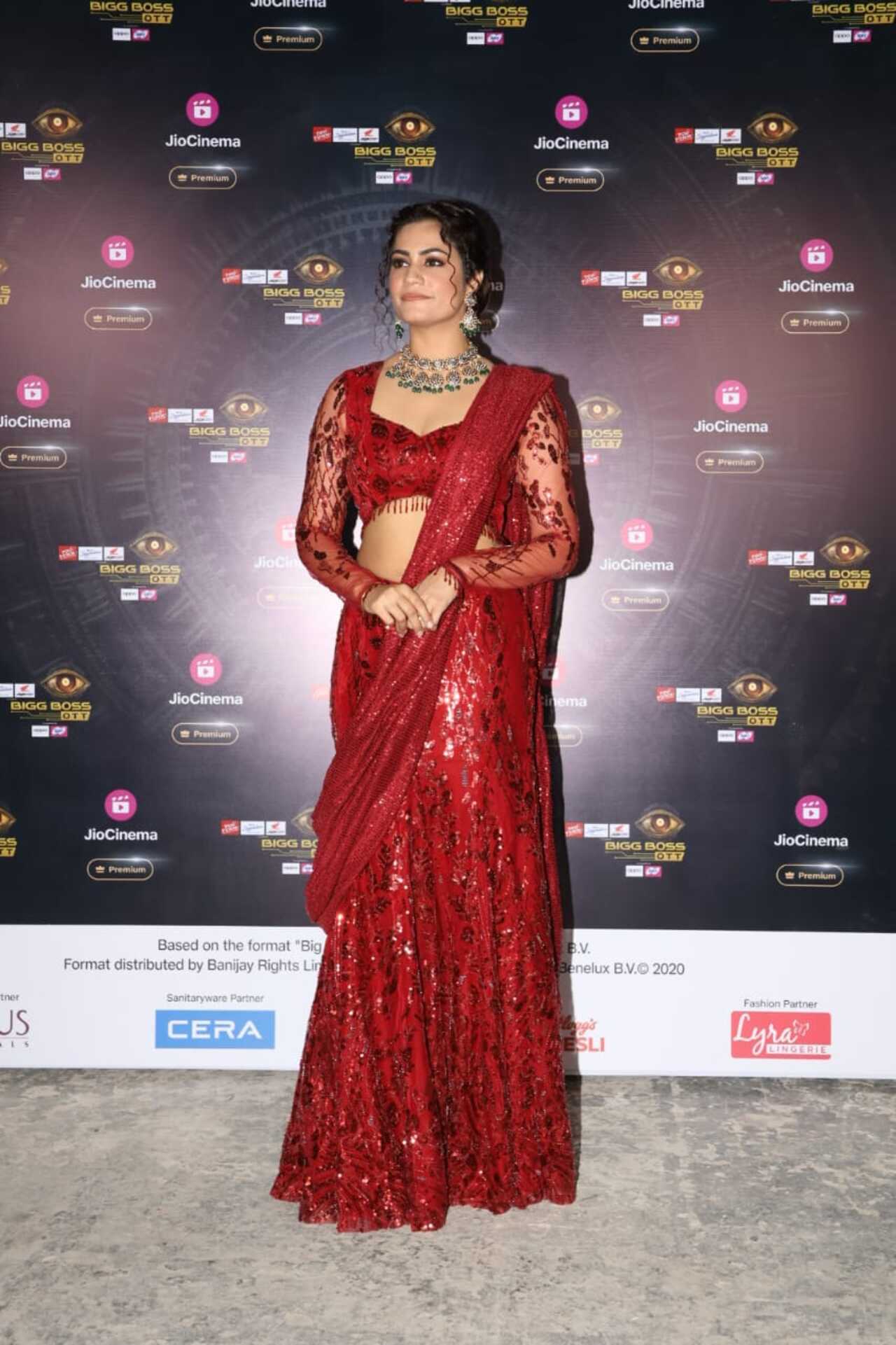 Finalist Kritika Malika looked bespoke in a shimmery red ensemble as she posed for the paparazzi.  