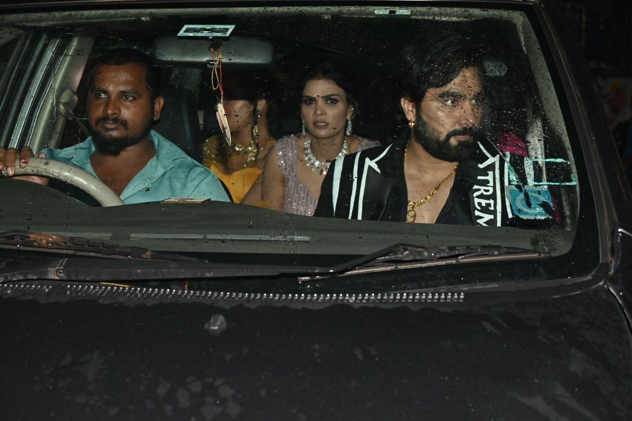 Armaan Malik and Payal Malik were spotted in their car as they left the venue amid heavy rains. 