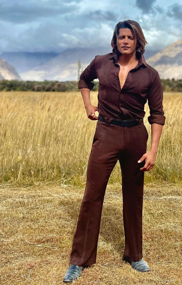 In another look, Karanvir Bohra struck a stylish pose in an all-brown outfit
