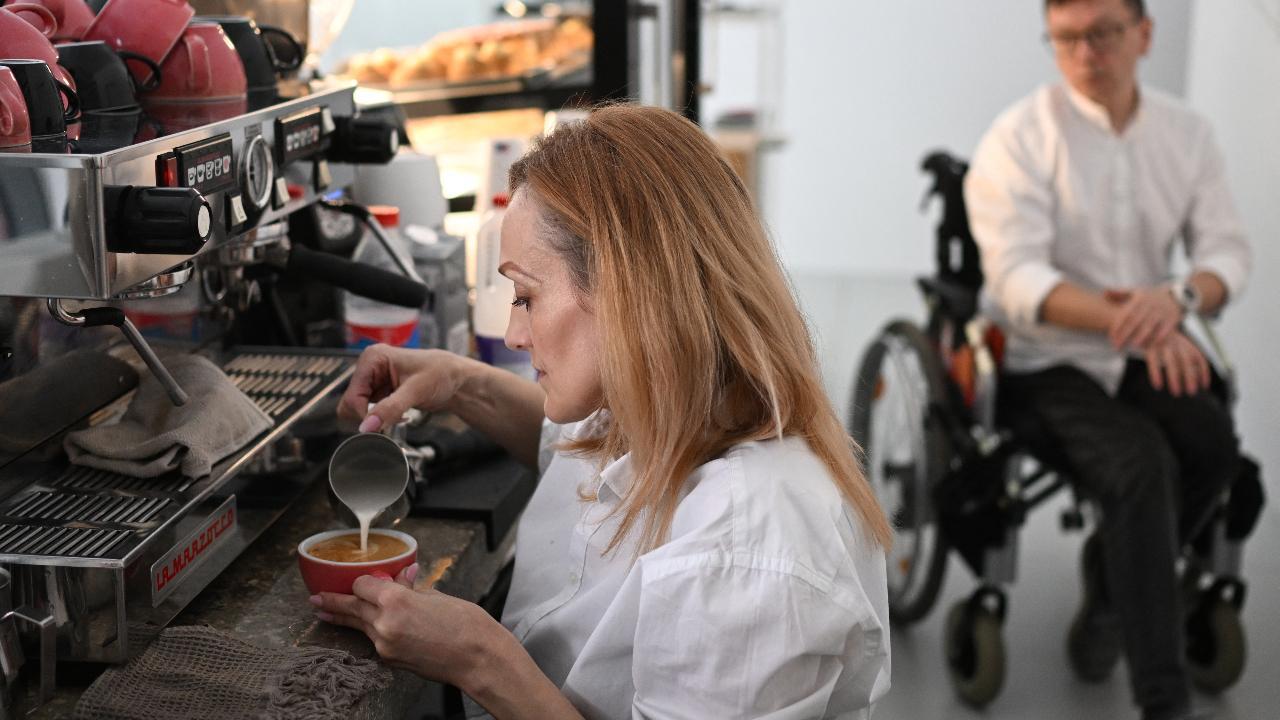 The Belarusian wheelchair barista 'making the world better'