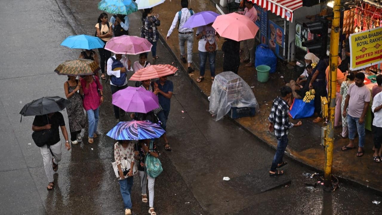 IN PHOTOS: Rains lash parts of Mumbai as IMD predicts light showers