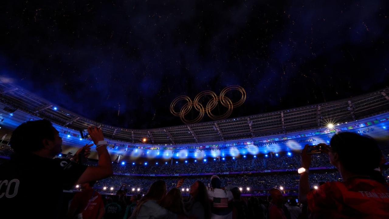 Around 9,000 athletes were in the stadium to be entertained by 270 performers and artists in a ceremony billed as a celebration of humanity and the unifying power of sport.