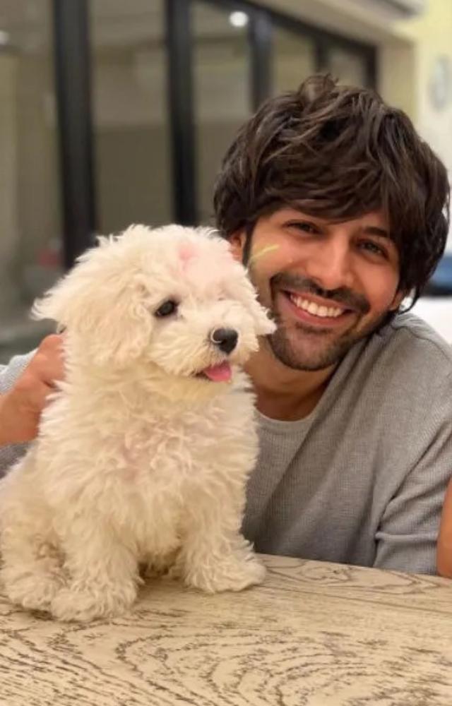 Kartik Aaryan`s playful personality is mirrored in his love for his dog Katori. His furry friend is often seen accompanying him shoots and is a source of joy