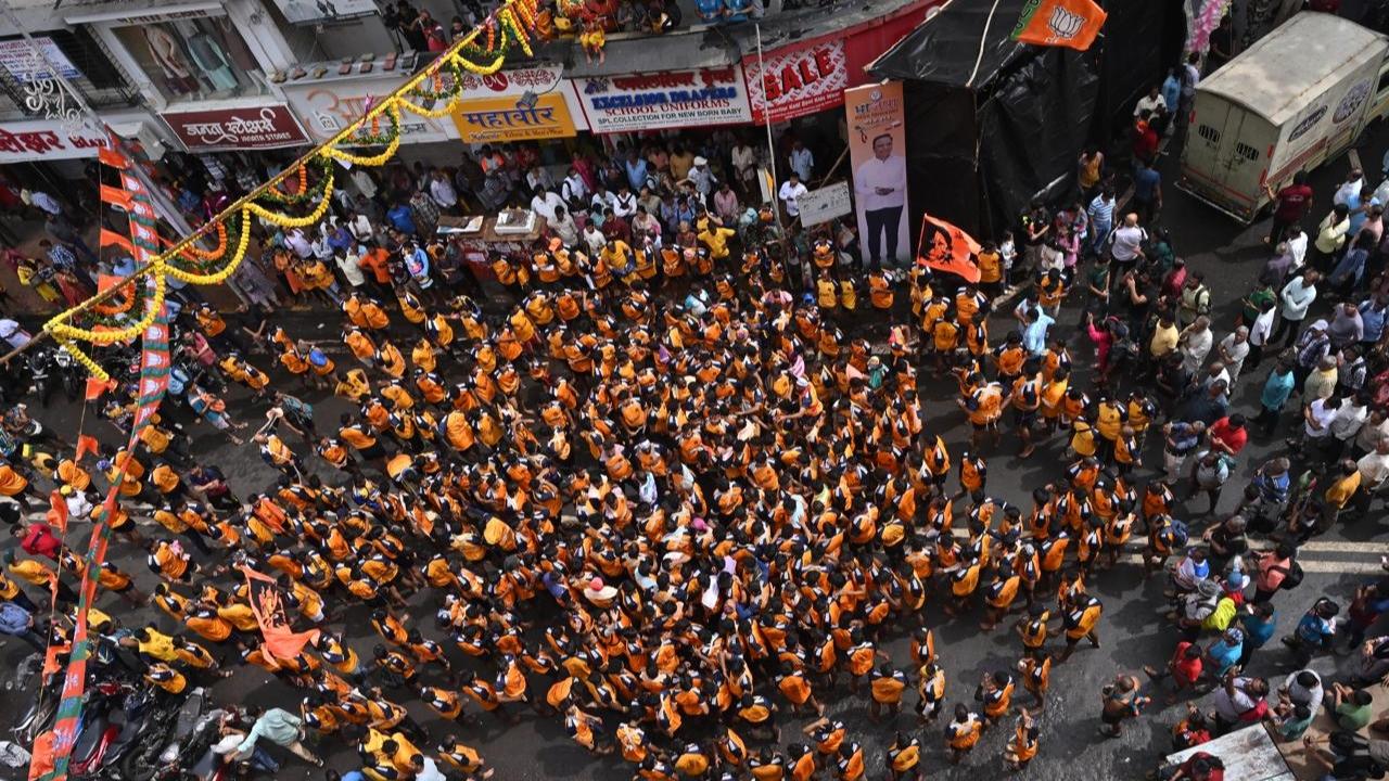 During the festival, 'Govindas' or Dahi Handi participants form multi-tiered human pyramids to break 'dahi handis' (earthen pots filled with curd) suspended in the air