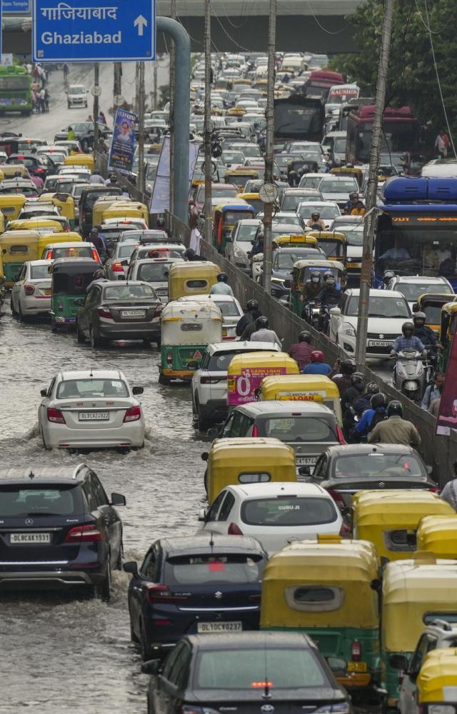 Traffic is disrupted on Minto Road due to waterlogging under Minto Bridge, with diversions at Connaught Place Outer Circle and Minto Road