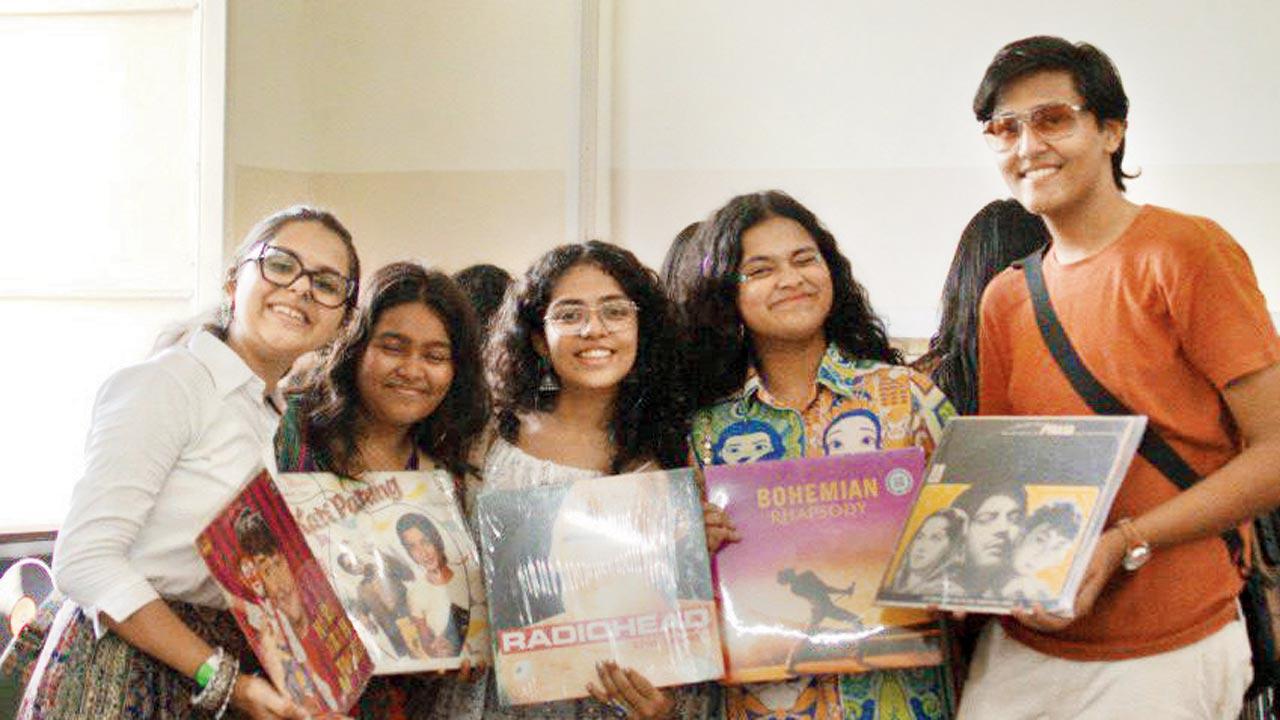 Students pose with their vinyl records 