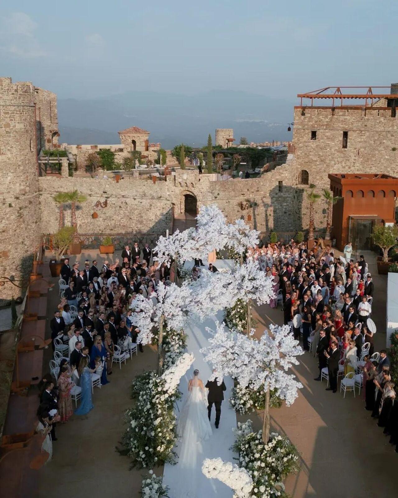 Several more wedding pictures were shared by Vogue. They also shared an aerial shot of the wedding venue which was covered in white flowers