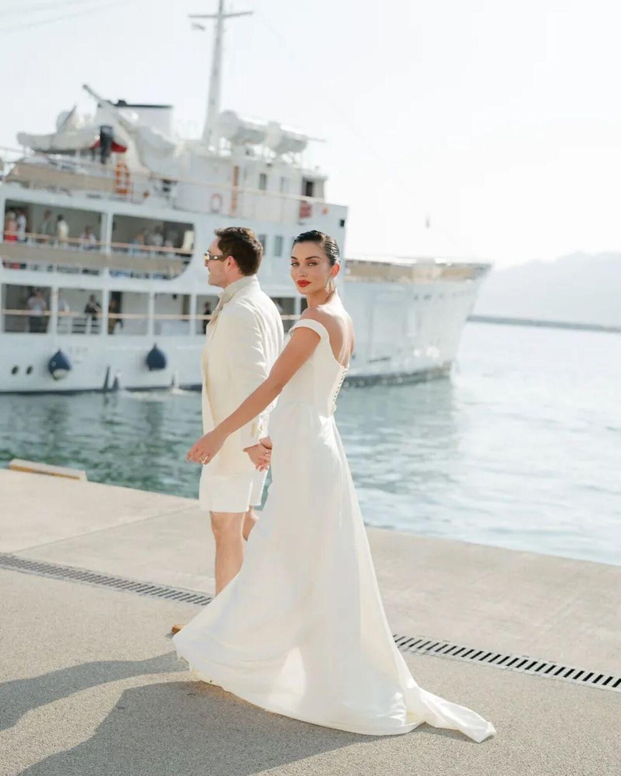 The couple delighted their fans by sharing the first official pictures from their picturesque wedding held in Italy, offering a glimpse into their magical day.