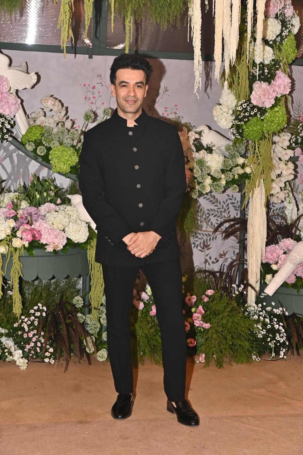 Film director Punit Malhotra looked dapper in a black sherwani set. 