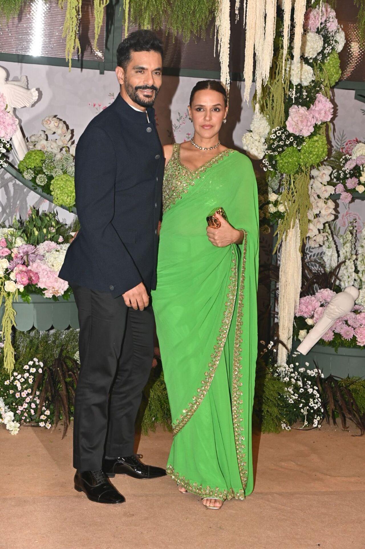 Neha Dhupia and Angad Bedi served couple goals in traditional looks. 