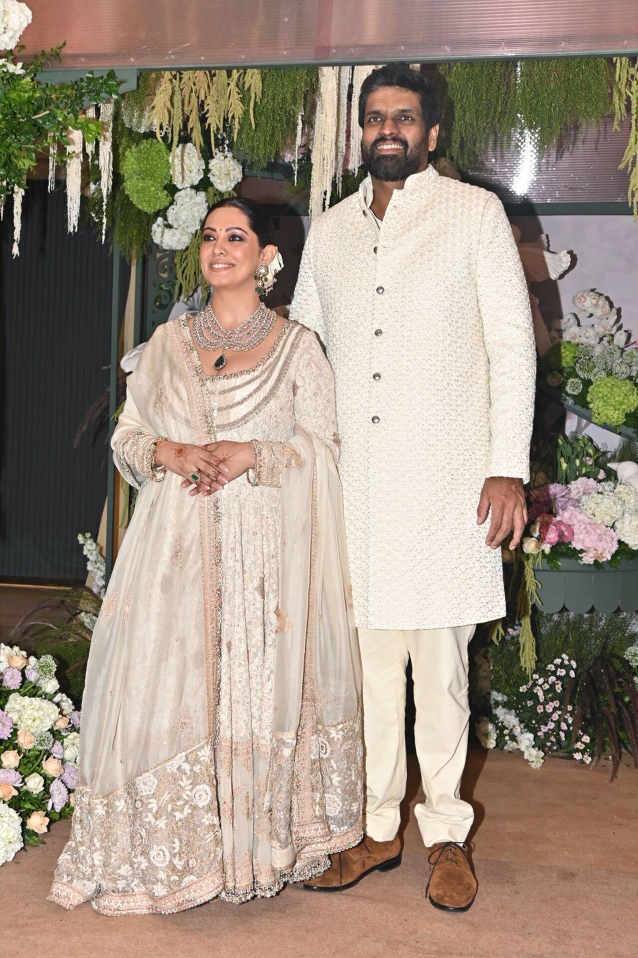 The couple of the hour, Lakhani and Bhagchandka, were the epitome of elegance in their choice of attire. Lakhani looked ethereal in a pastel-hued lehenga, while Bhagchandka was equally stylish in a crisp white kurta suit. 