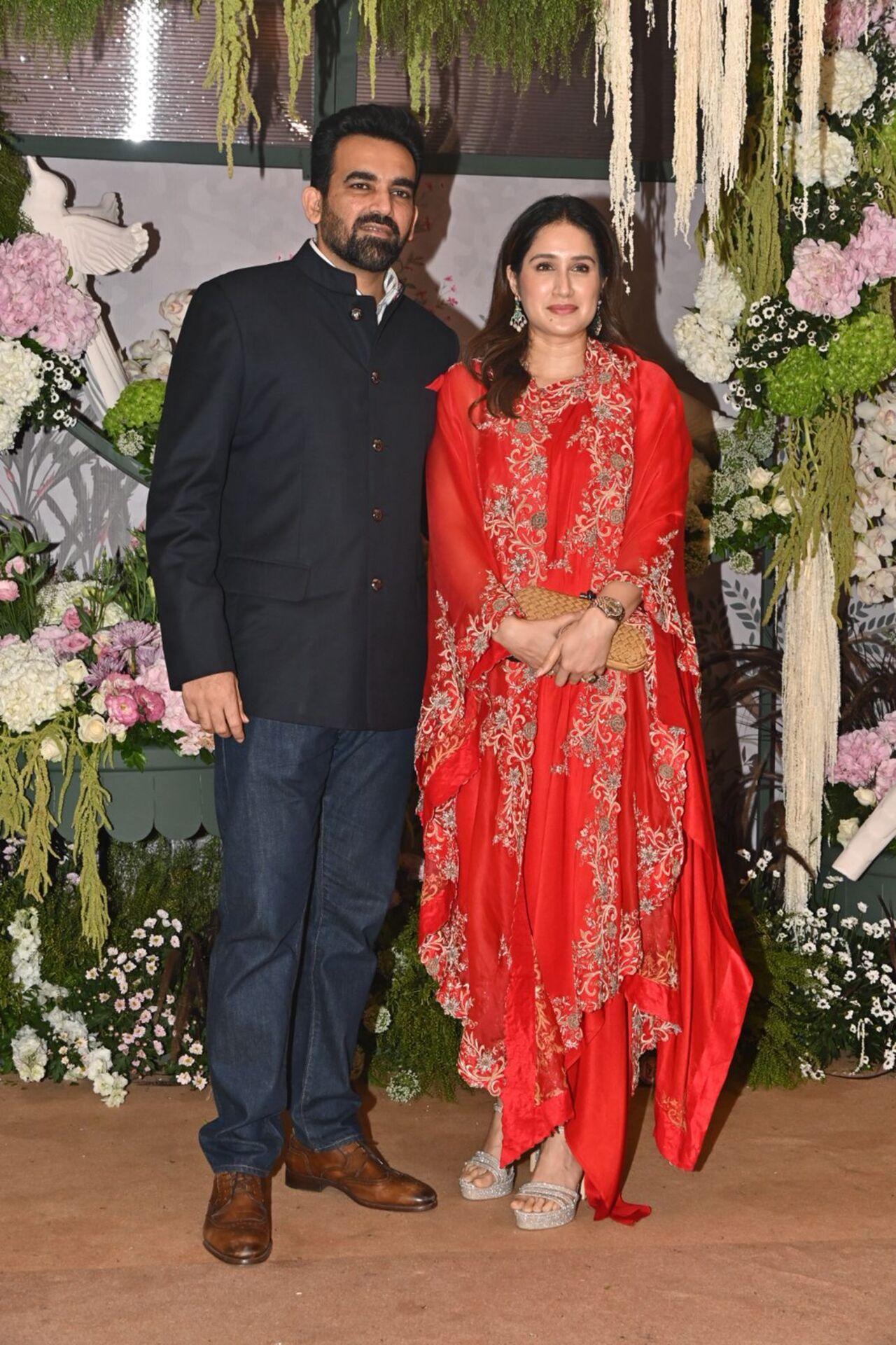 Zaheer Khan looked dapper in a bandhgala set while his wife and actress Sagarika Ghatge looked bespoke in a red salwar-kurta set. 