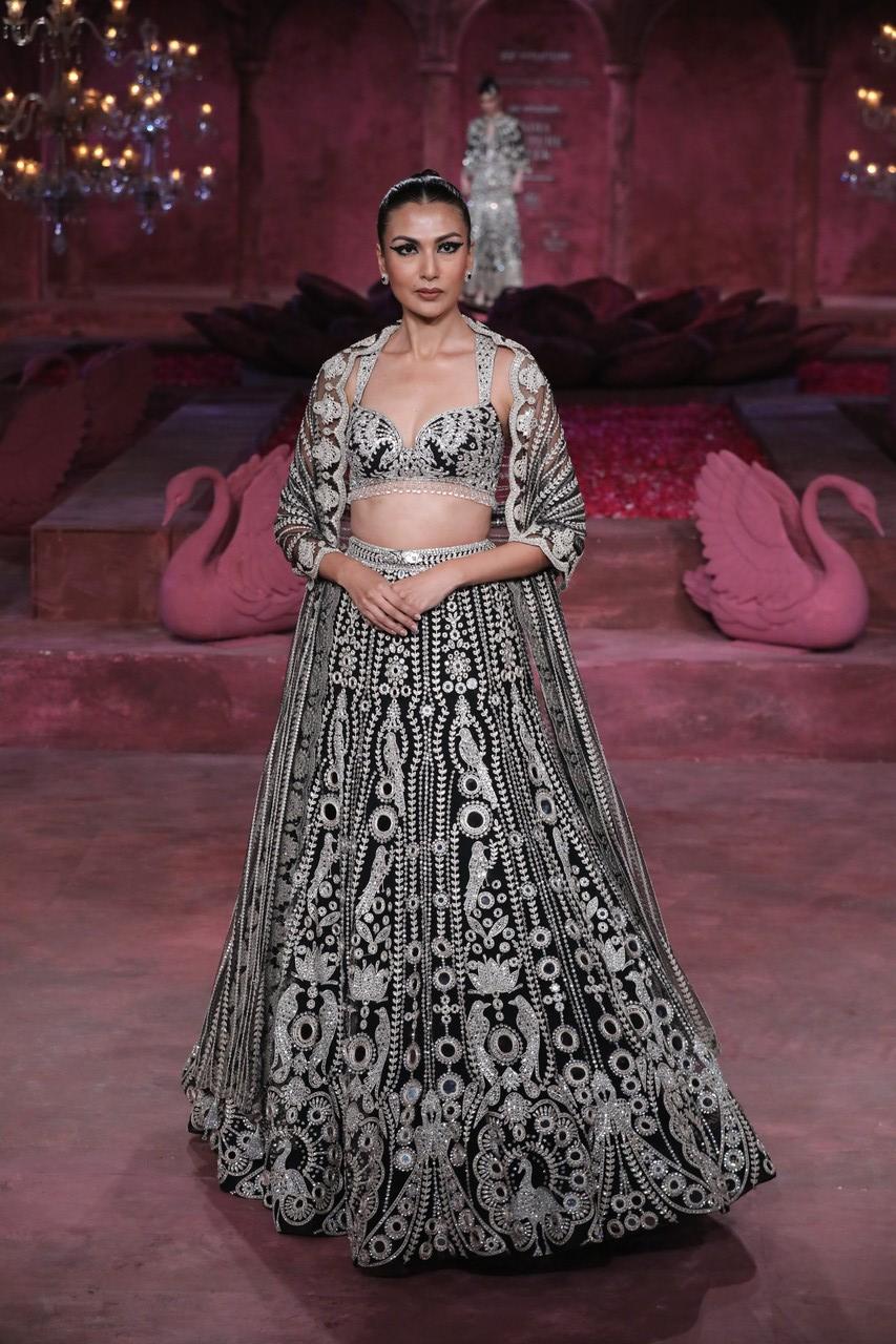 Luxurious silks, rich velvets, and intricate embroideries evoke the splendor of royal courts. 