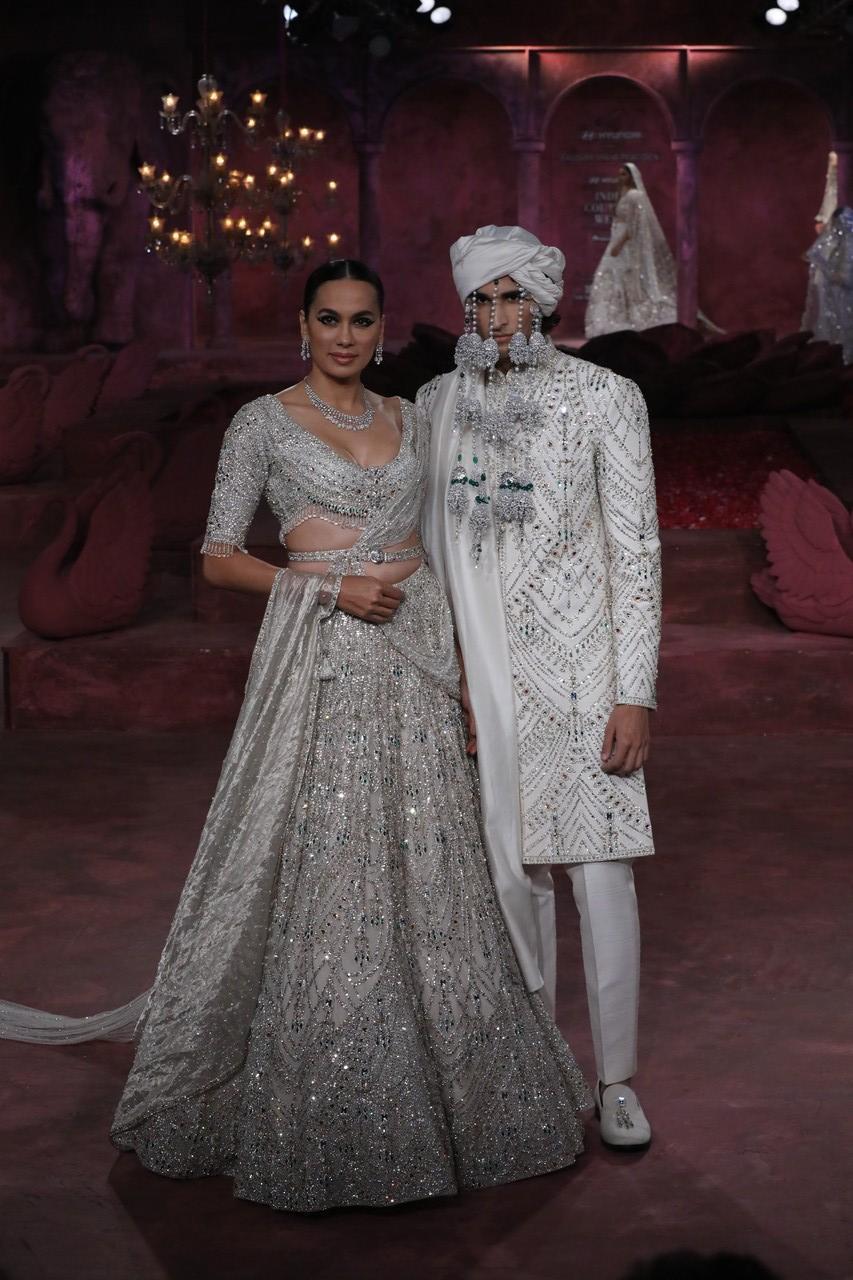 It draws inspiration from India's majestic symbols: resplendent parrots and peacocks, serene swans, powerful horses, and elephants.