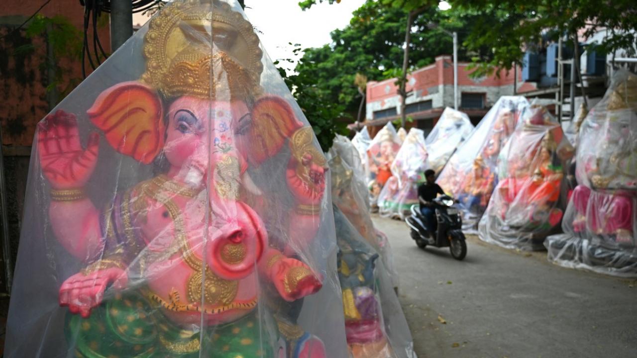 Ganesha idols line up a street ahead of the Ganesh Chaturthi festival, in Chennai on August 29, 2024