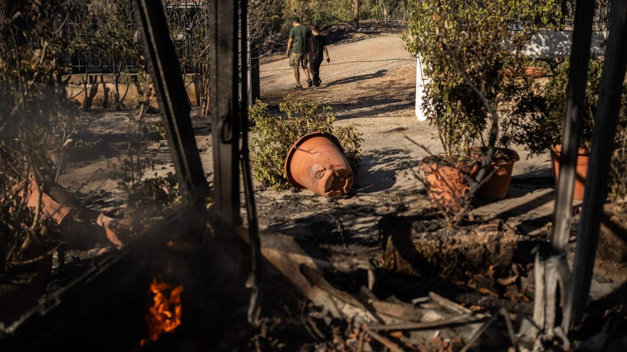 Fire Department spokesperson Col Vassileios Vathrakogiannis said firefighters were longer battling a single front but many active localized blazes, mostly around Marathon and Pendeli