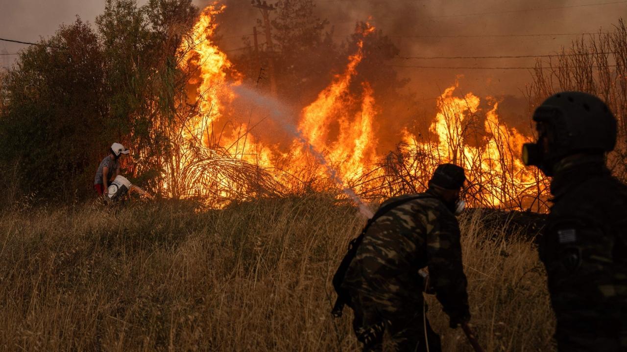 IN PHOTOS: Wildfire in Athens northern suburbs in Greece, one killed
