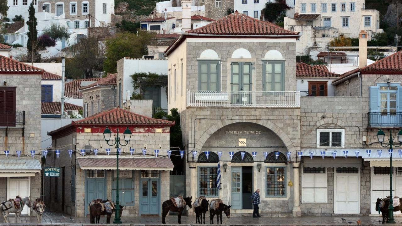 Greek islands and tourists search for 'balance' amid summer crush