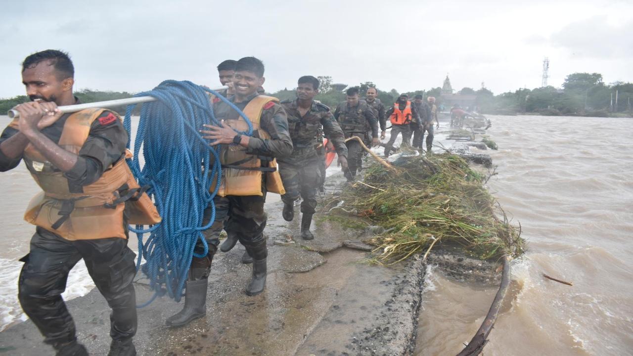 In Photos: Flood situation improves in some parts of Gujarat but relief ops on