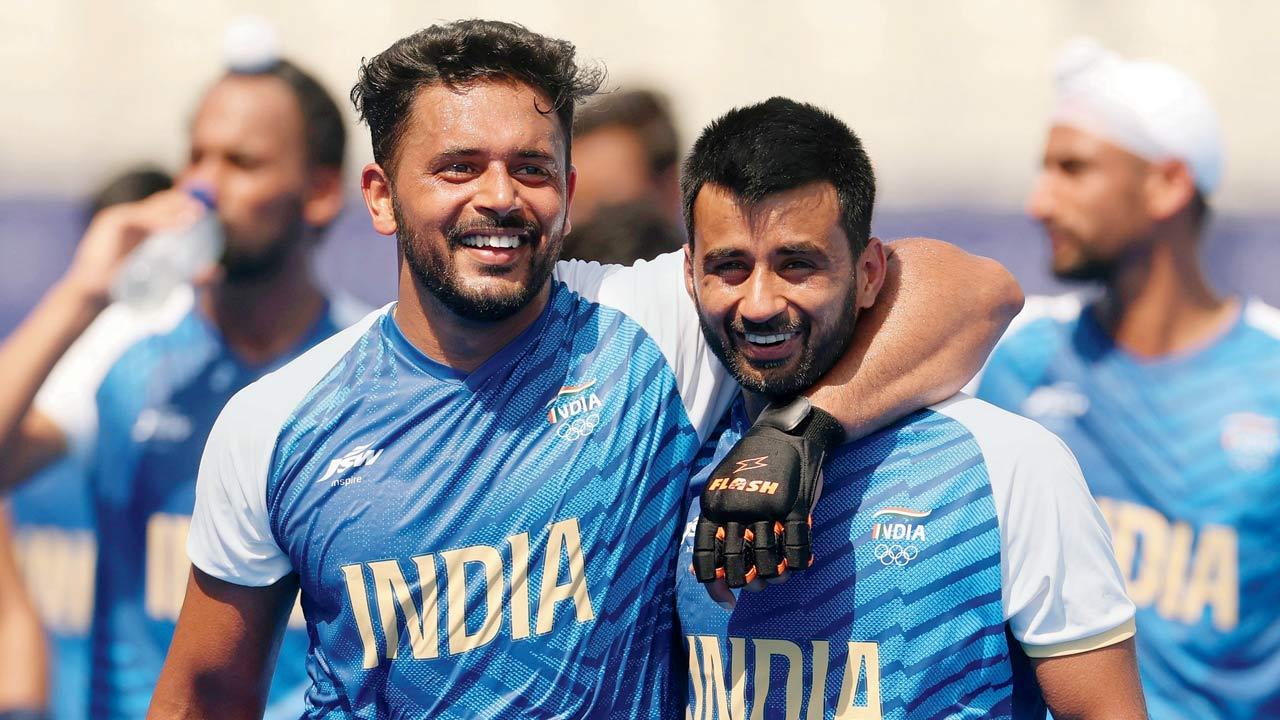 India captain Harmanpreet Singh (left) with Manpreet. Pics/Getty Images 