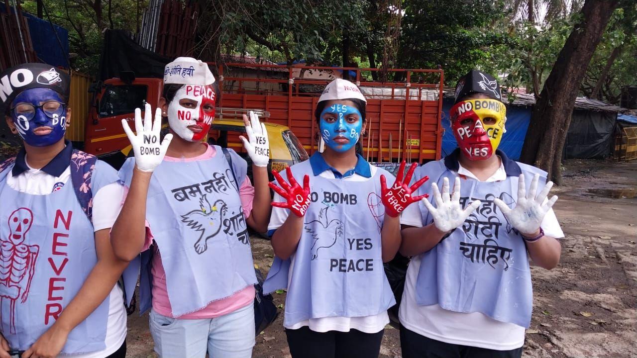 Approximately 600 students participated in the peace rally, visually representing the horrors of atomic bombs. 