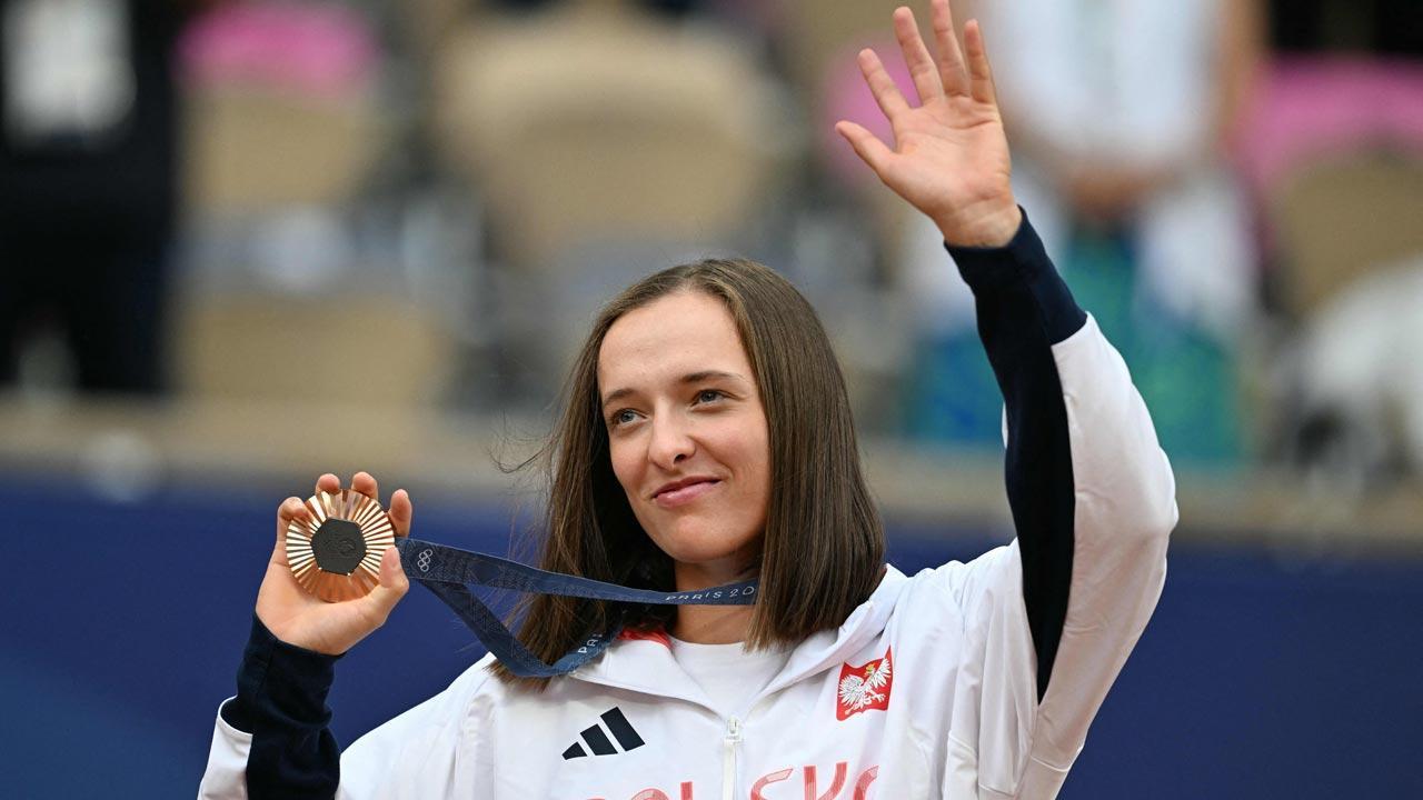Iga Swiatek wins bronze for Poland's first tennis medal at any Summer Games