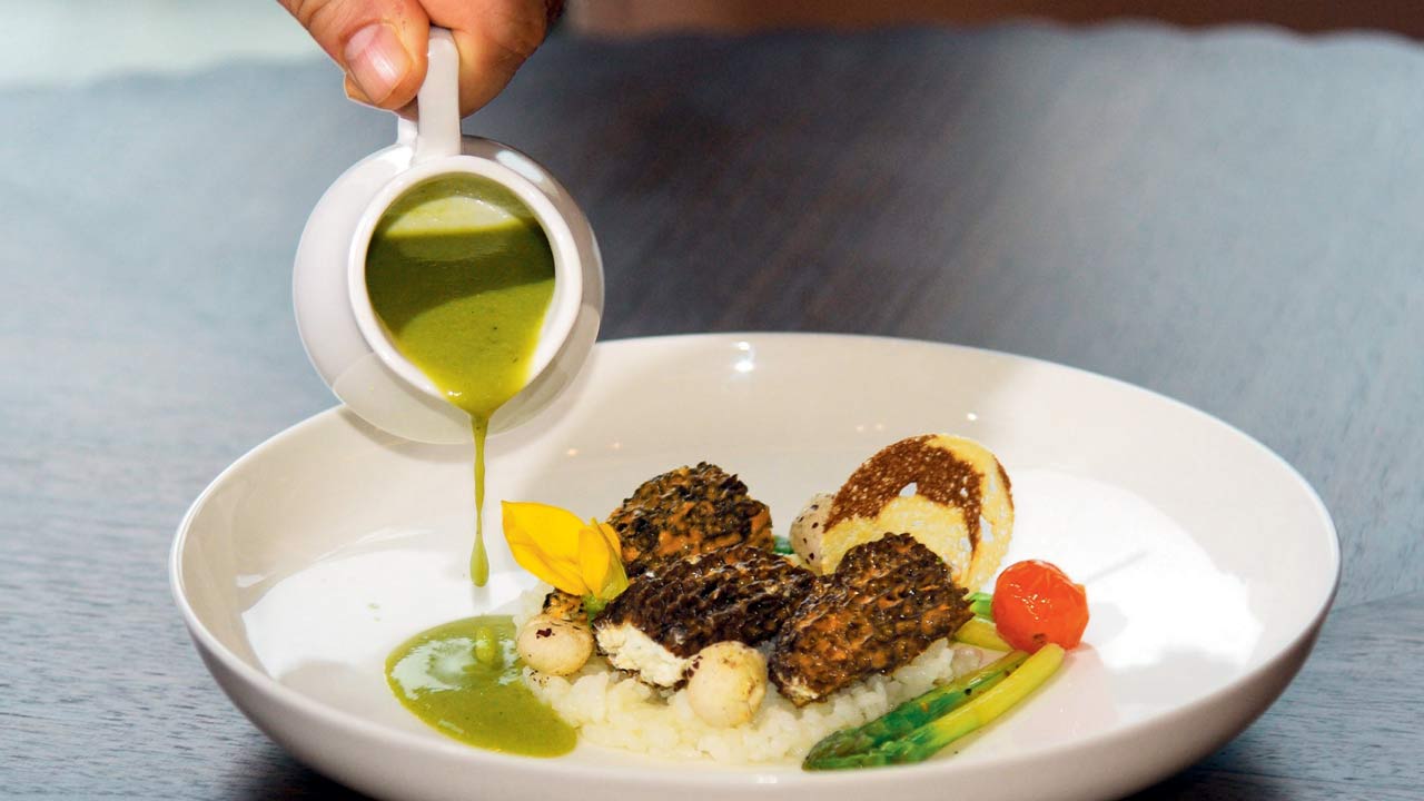 Guchhi matar, asparagus and Kashmiri morel pulao at Indian Accent. File pic