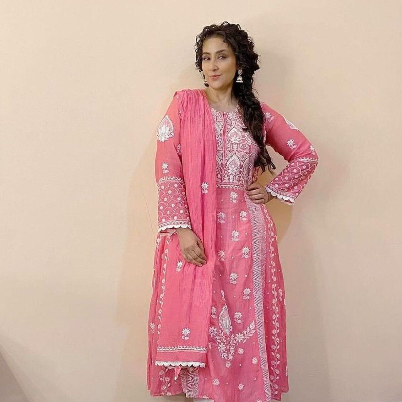 Manisha Koirala is seen wearing a chikankari salwar suit by Ehaab Couture, a brand backed by Richa Chadha and Ali Fazal to promote the artisans of Lucknow. 