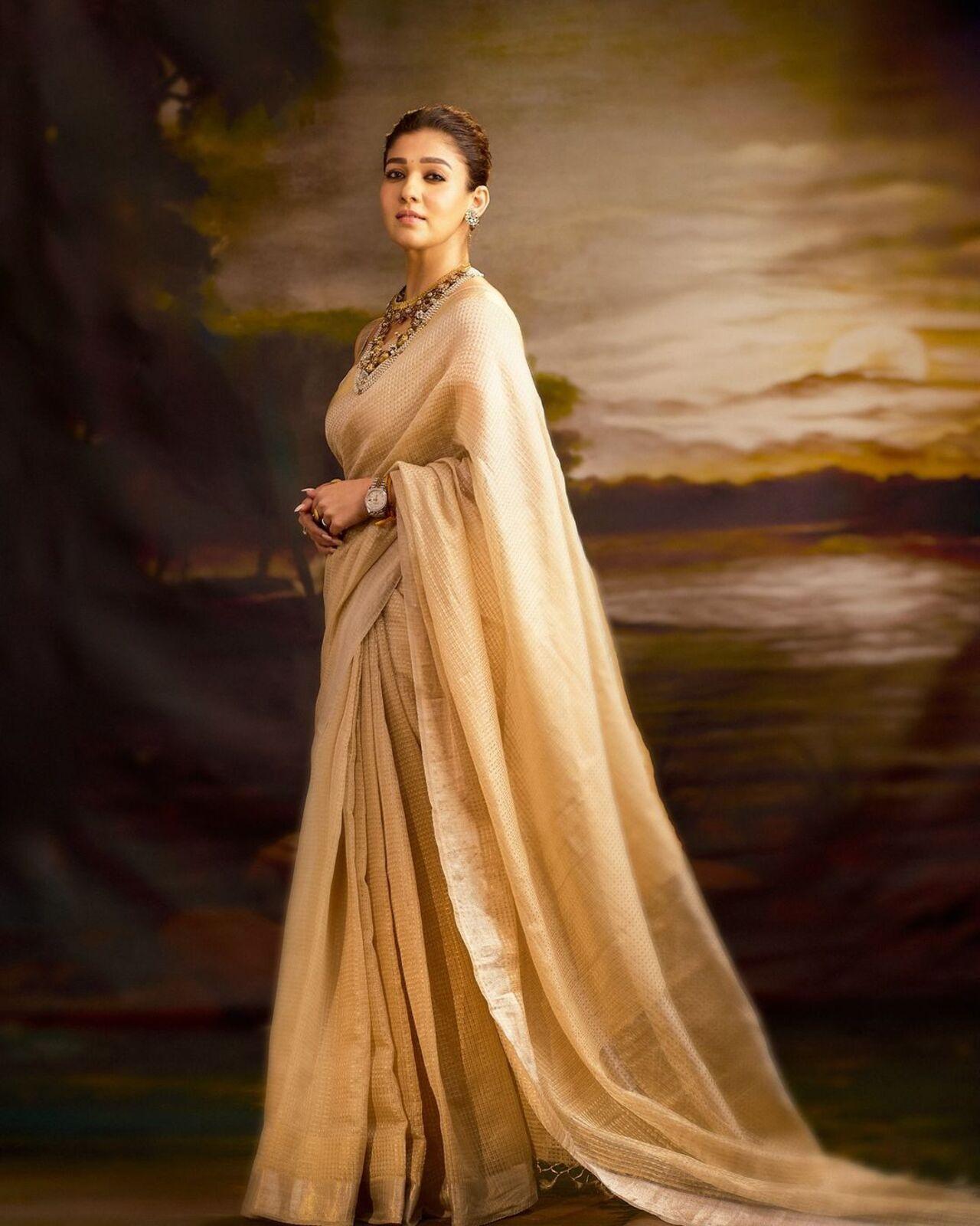 Nayanthara ditched the bigwigs for a saree from Neela by Anuvardhan. She wore it for the Ambani wedding and exuded royalty in the six-yard crafted in the richness of silver and gold zari, intricately woven into premium Kota fabric.