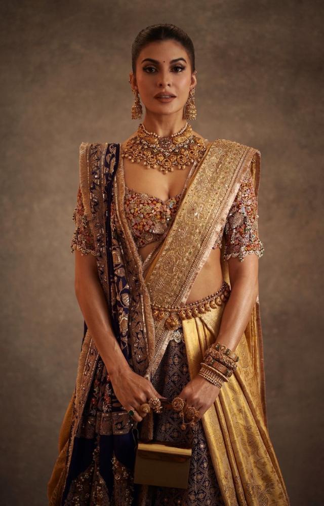 Jacqueline turned heads at Anant Ambani and Radhika Merchant`s wedding when she arrived like a queen in this gorgeous lehenga. 
