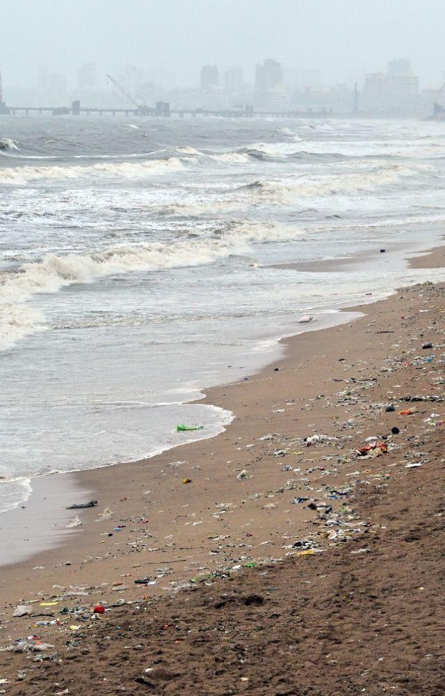 Only the sound of waves and rain filled the air as visitors avoided going to the beach owing to the high tides.