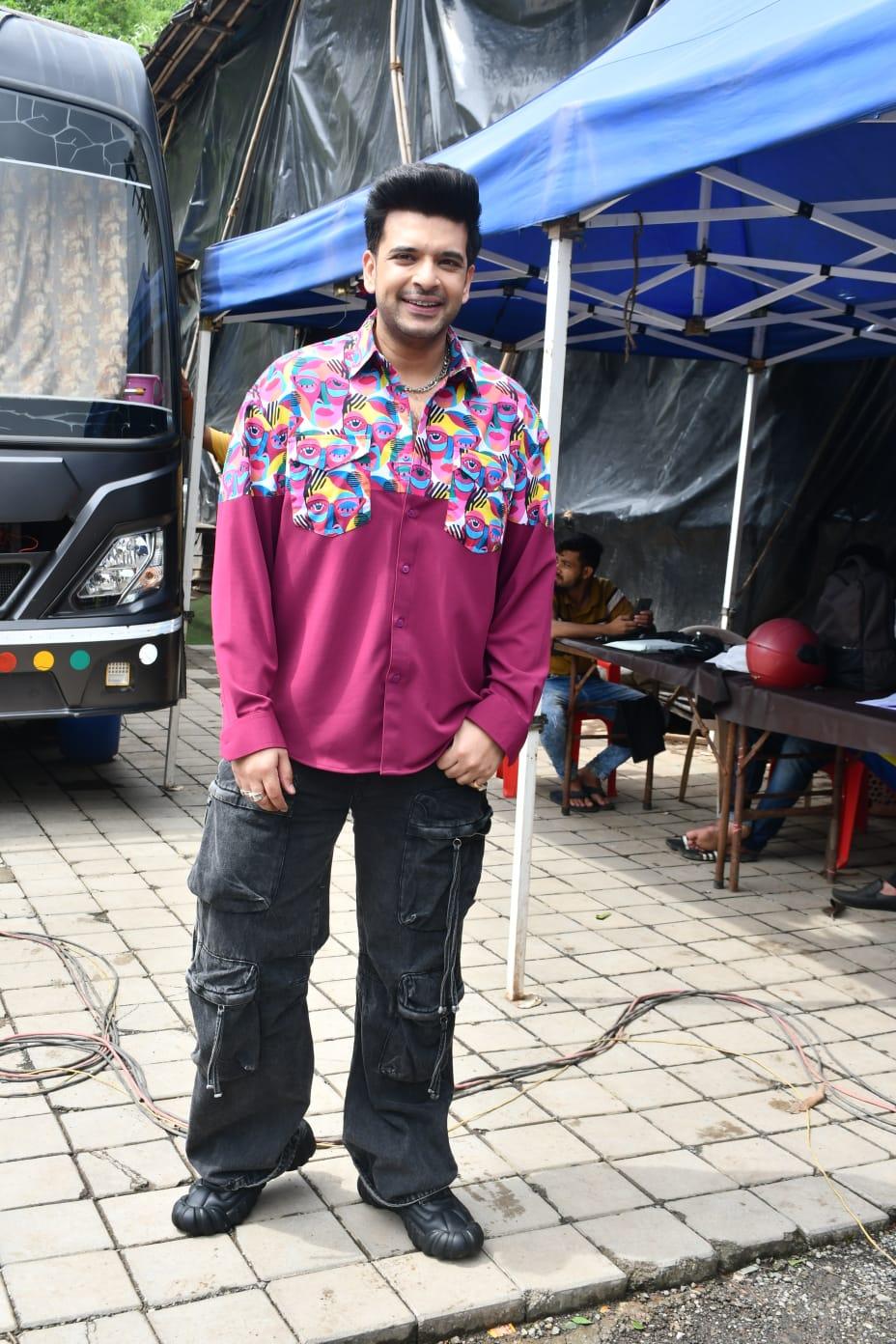 Karan Kundra later changed it to a fancy pink shirt and looked equally smart