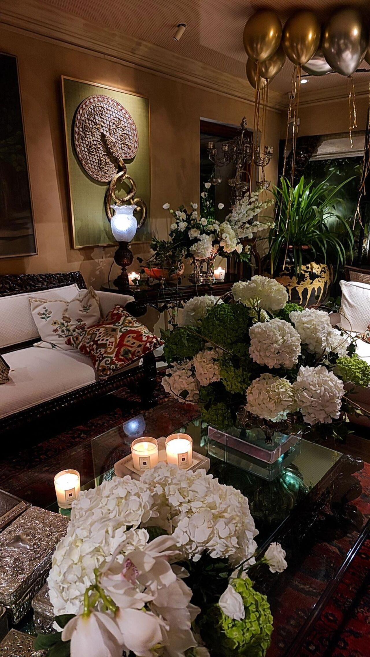 Masaba was surrounded by flowers and candles that added warmth to the occasion. 
