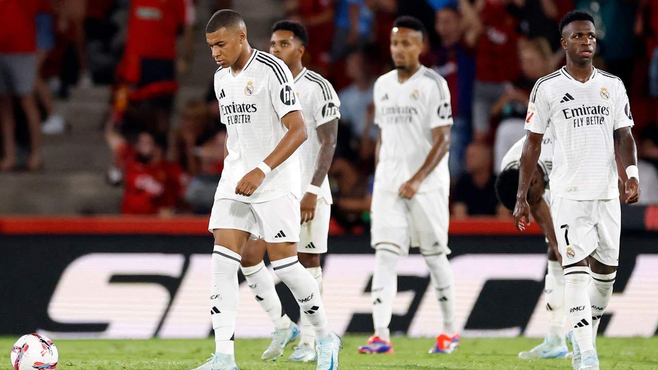 No goal for Mbappe in his Spanish league debut as Real Madrid draws 1-1