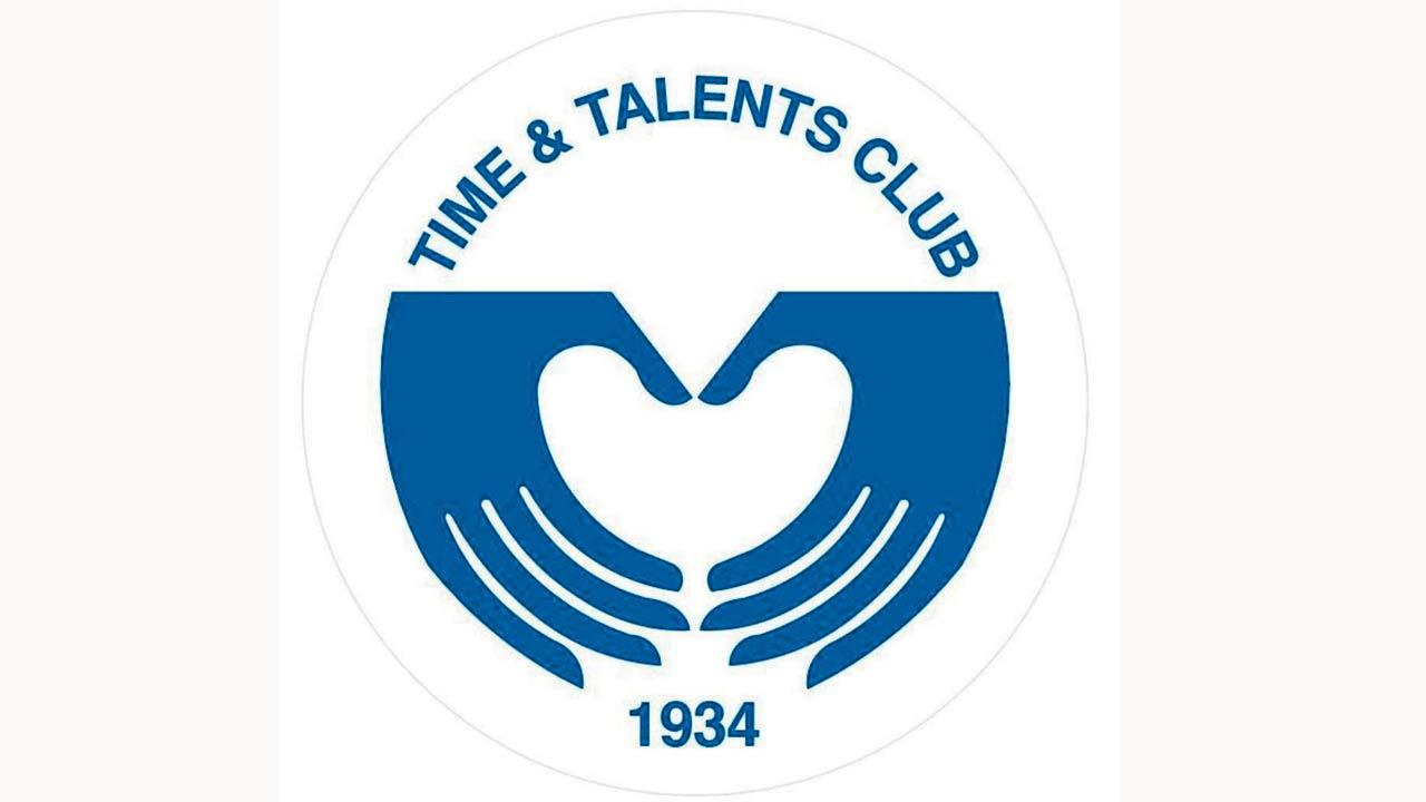 Club logo with a heart and helping hands motif, designed by Walter Saldanha