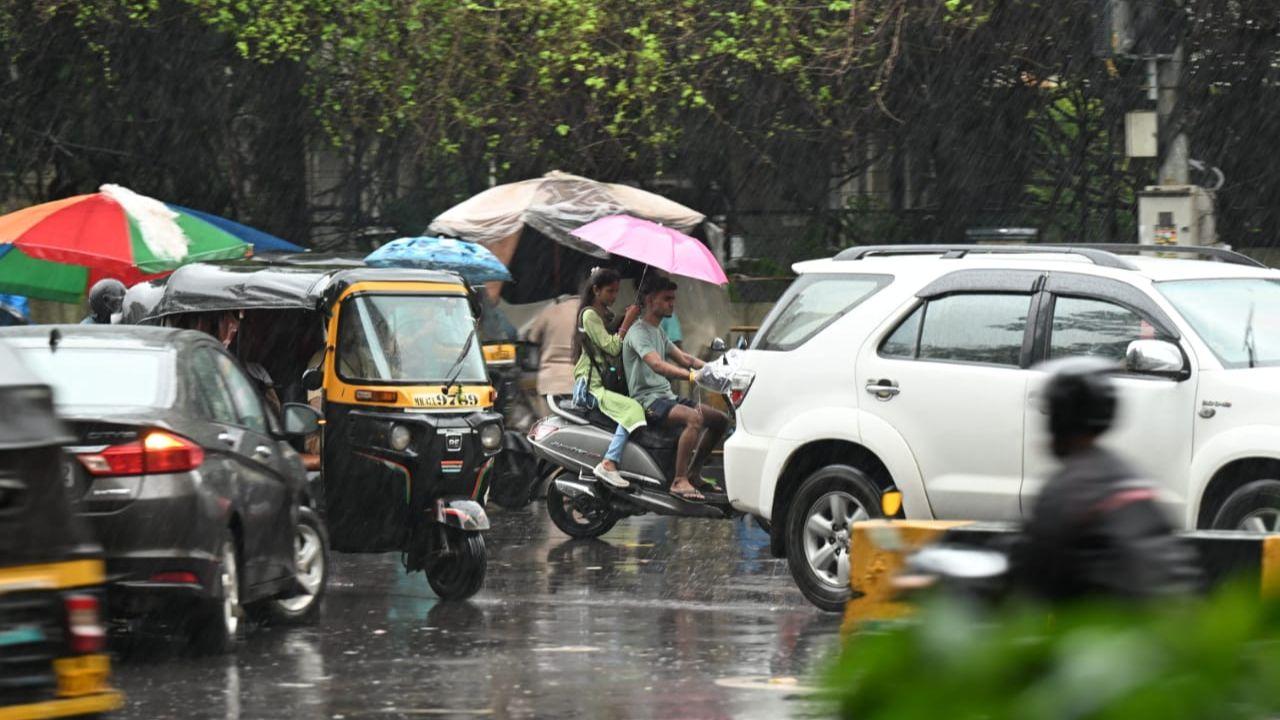 The downpour was met with gusty winds that even caused a man's umberella to flip and break. 
