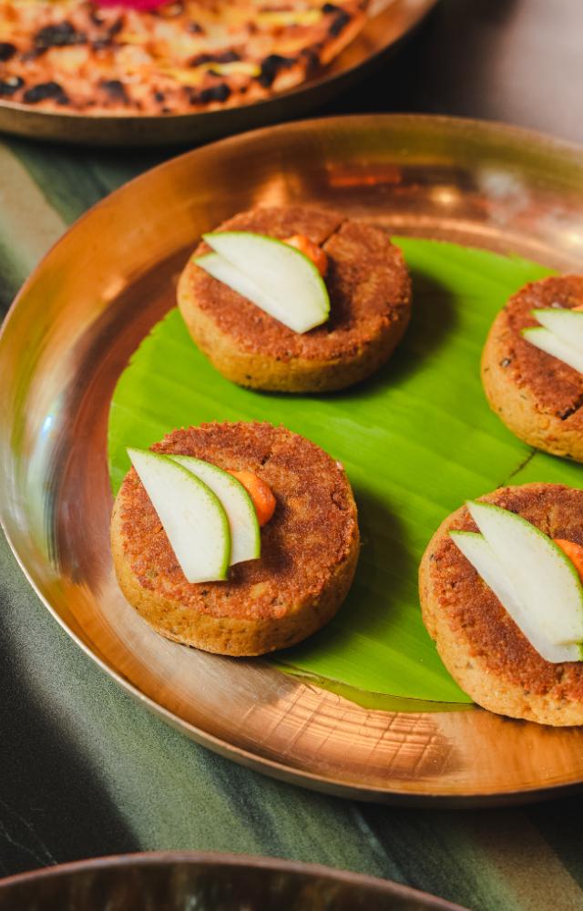 Non-veg options include Ambala Chicken Curry, Methi Chicken and Paperwali Salmon En Papillote.