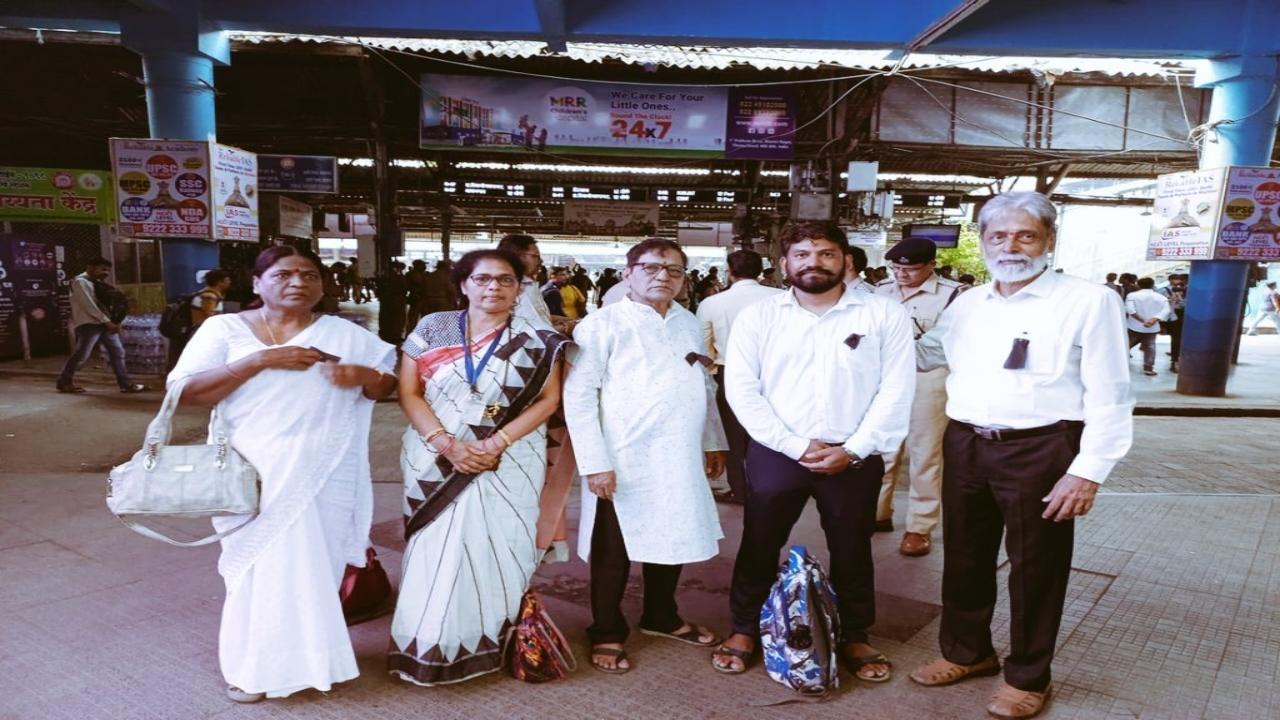 Members of the passenger associations assemble early on Thursday at Thane station before the protest.