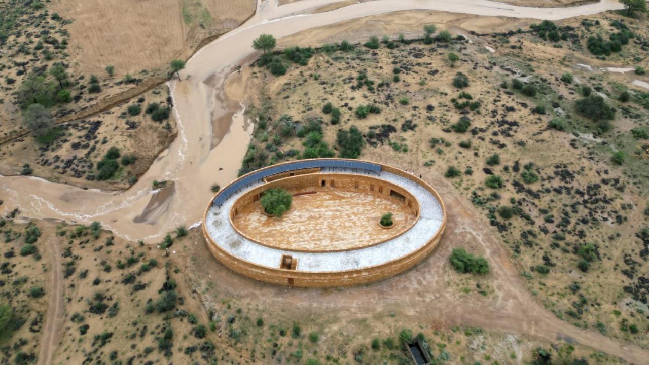 Temperatures inside the school, designed by US-based architect Diana Kellogg and built by local artisans can be as much as 20 percent lower than those outside.