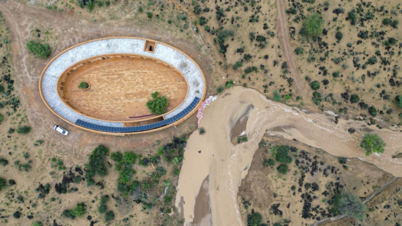 Like the fort, the school has thick rubble walls that help bounce back the heat, while the interior is plastered with lime, a porous material that regulates humidity and aids natural cooling. Unlike the ancient fort, its roof is lined with solar panels, which provide all the school's power in an area with frequent electricity cuts.