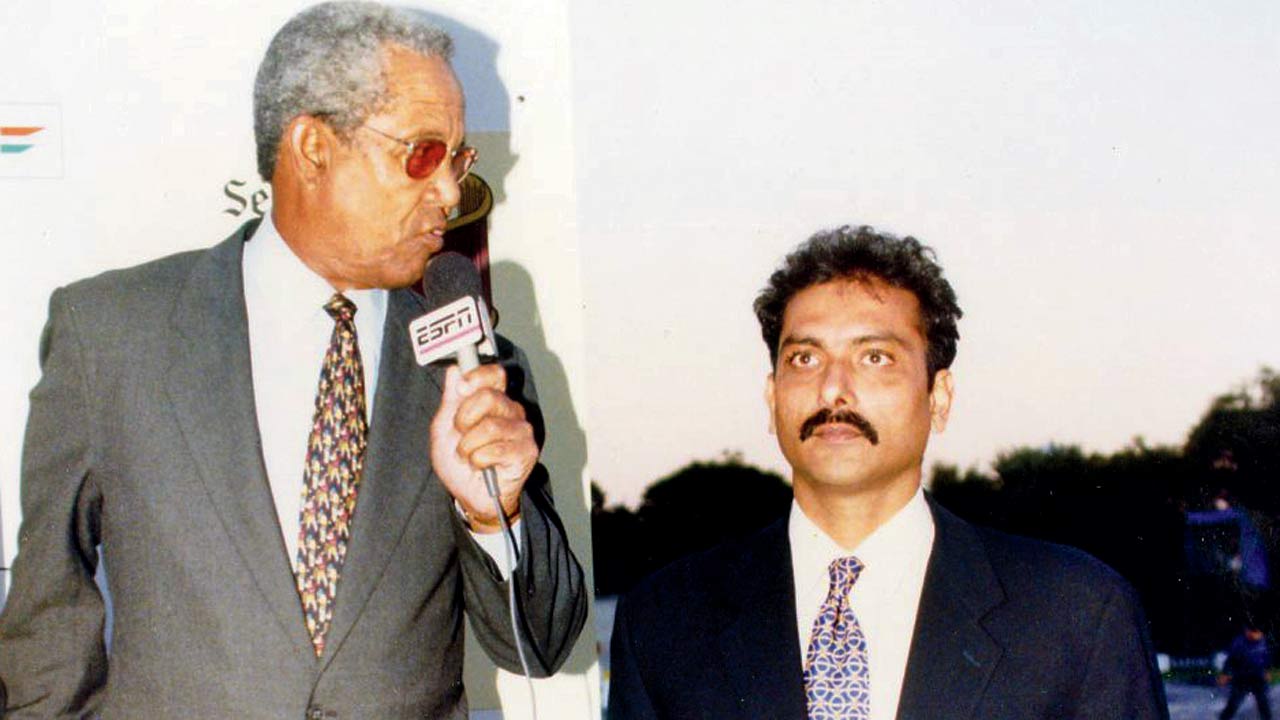 With Sir Garfield Sobers at a tournament in the 1990s